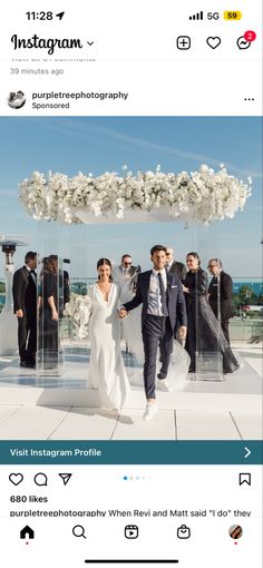 the instagram page on instagram shows an image of a bride and groom walking down the aisle