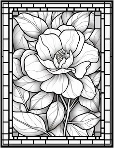 a black and white stained glass window with flowers in the center, surrounded by leaves