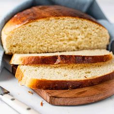 a loaf of bread sitting on top of a cutting board