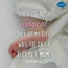 a baby's foot under a blanket with the words still the most magical day of my life was the day i become a mom