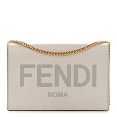 This Is An Authentic Fendi Vitello King Tamponato Logo Embossed Medium Wallet On Chain In Ghianda.Luxury Chain Wallet Is Crafted Of Gray Calfskin Leather And Features A Waist-Length Gold-Tone Chain-Link Shoulder Strap And A Front Flap That Is Detailed With An Embossed Fendi Logo. This Unique Shoulder Bag Opens To A Card Slot Panel, Billfolds, And A Currency Compartment With Plenty Of Room For Everyday Necessities. Comes With Card Of Authenticity And Dust Bag Fendi Kan I Bag, Fendi Bucket Bag, Fendi Crossbody Bag, Fendi Pink, Fendi Wallet On Chain, Fendi Logo, Leather Camera Bag, Mini Bucket Bags, Adjustable Bag