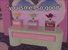 there are two boxes on the table with flowers in them that say, you smell so good