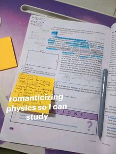 an open book with writing on it next to a calculator, pen and sticky notes