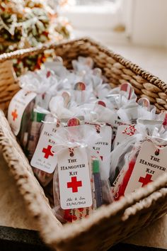 the baskets are filled with medical items and tags for sale in front of christmas trees