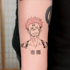 a person with a tattoo on their arm that has an anime character drawn on it