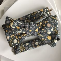 "Handcrafted bow tie for Men. Available in self tie or pre-tied Bow tie. Self tie style are made with adjustable and detachable straps to give the option of keeping the perfectly tied bow tie in place or retying each wear. Each Bow Tie tie is handmade by myself in Canada. My bow ties are made with the best novelty fabrics. Self tie bow tie fits approximately 15-21\" neck width Adjustable Neck Width for pre-tied bow tie options: Pre-tied bow tie size S (Baby -Toddler) Bow Measurement 1 3/4\" wide x 3 1/8\" long Adjustable straps fit 8.5\" up to 14\" neck circumference. Pre-tied bow tie size M (Child/Teen) Bow Measurement 2 3/8\" wide x 4\" long Adjustable straps fit 10\" up to 18\" neck circumference. Pre-tied bow tie size L (Adult) Bow Measurement 2 3/8\" wide x 4 5/8\" long Adjustable str Adjustable Detachable Bow Tie, Dapper Adjustable Bow Tie With Detachable Bow, Adjustable Dapper Bow Tie With Detachable Bow, Bow Tie For Men, Plaid Bow Tie, Tie Tie, Tie For Men, Pre Tied Bow Tie, Toddler Bows