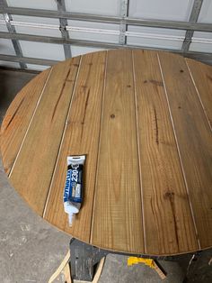 a table that has some batteries on it and is being worked on by someone else