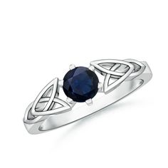 Exuding a distinctive classic charm, this solitaire sapphire ring is designed in 14k white gold. A round blue sapphire is held in a six-prong setting amid an ornate shank style. The Celtic knot carved on the shank is exquisite and lends a timeless appeal to this elegant sapphire ring. Celtic Knot Jewelry, Celtic Knot Ring, Round Sapphire, Contemporary Ring, Etsy Wedding Rings, Knot Ring, Personalized Rings, Blue Sapphire Rings, Sapphire Stone