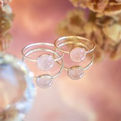 Elevate your style with our dainty rose quartz ring. Delicately crafted and imbued with the gentle energy of rose quartz, this ring exudes feminine grace and timeless beauty. Perfect for adding a touch of elegance to any outfit or as a meaningful symbol of love and compassion. Don't know your ring size? Ring Size Guide or Buy Ring Sizer…………………………………. Details: Stone is Natural Rose Quartz, measuring 8mm Available in 14k Gold Filled or Sterling Silver Waterproof and can be worn everyday Size Inclu Delicate Rose Gold Sterling Silver Crystal Ring, Round Rose Quartz Birthstone Jewelry, Dainty Rose Gold Sterling Silver Crystal Ring, Delicate Rose Gold Crystal Ring, Round Rose Quartz Promise Ring, Minimalist Rose Gold Stackable Gemstone Rings, Minimalist Rose Gold Stackable Rings With Gemstones, Rose Quartz Crystal Promise Ring, Dainty Rose Gold Stackable Crystal Ring