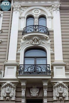 an ornate balcony and balconies on the side of a building