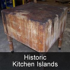 an old wooden table sitting in a garage