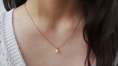 This delicate necklace is just perfect to wear on its own or layered with your favourite pieces! Pearls are also the birthstone of anyone born in the month of June. D E T A I L S *It features a single AA grade cultured white teardrop pearl. *It is suspended from a super dainty stainless steel chain. Chain is available in 14k gold, rose gold and silver. *Stainless steel is very hard wearing and will not tarnish or oxidise. It is also amazingly hypoallergenic. *Necklace comes with a crystal inform Dainty Teardrop Pearl Necklace For Everyday, Simple Pearl Drop Necklace For Everyday, White Dainty Drop Necklace For Everyday, Dainty White Drop Necklace For Everyday, Dainty Teardrop Pearl Necklace, Rose Gold Necklace With Pearl Pendant For Everyday, Everyday Rose Gold Necklace With Pearl Pendant, Elegant Tiny White Necklace, Dainty White Solitaire Necklace For Everyday