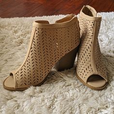 Never Been Worn! Brand New!!! Bella Marie Size 6.5, Tan, Open Toe, 3.5 Inch Thick Heel With Cute Cutouts, Buckle Detail, And Zipper In Back. No Box, Sorry. Perfect For Summer Summer Casual Ankle-high Booties, Summer Booties With Round Toe Medium Width, Summer Booties With Round Toe And Medium Width, Trendy Spring Booties With Closed Toe, Trendy Closed Toe Booties For Spring, Beige Ankle-high Heels For Spring, Trendy Spring Closed Toe Booties, Ankle-high Beige Heels For Spring, Spring Beige Booties