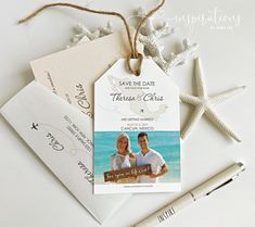 save the date card with starfish and beach theme on it next to two envelopes