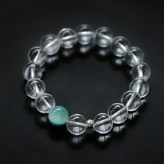 This bracelet features mesmerizing white crystal beads, each carefully selected for their clarity and luster, and the stretch design is comfortable and easy to wear, ensuring a perfect fit for any wrist size, whether worn alone for a minimalist look, or Stack with other bracelets for a more dramatic effect Gemstone:White Crystal,Pink Crystal,Amethyst,Green Cat Eye,Aquamarine Gemstone Dimensions:10mm Length:Small 130-140mm,Large 150-160mm,170-180mm(Micro elastic） Weight:22g-23g Green Cat Eye, Crystal Amethyst, Green Cat, Edison Pearls, Tiger Eye Stone, Aquamarine Gemstone, White Crystal, Beaded Stretch Bracelet, Pink Crystal