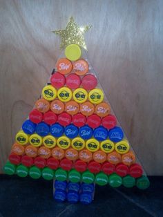 a christmas tree made out of soda bottle caps