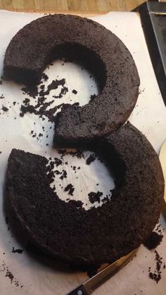 there is a chocolate cake that has been cut in half