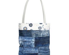 a tote bag with blue and white patchwork on the front, featuring sunflowers