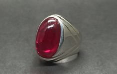 Cabochon Big Dark Deep Red Ruby Sterling Silver 925 Handmade Mens Heavy Ring Product: Ring Gemstone: Ruby Color: Red Handmade Ring It is heated and treated (lab created) but High Quality Ruby with pure 925 Sterling Silver Handmade Ring. Red Signet Ring For Formal Occasions, Red Formal Signet Ring, Formal Red Signet Ring, Red Cabochon Signet Ring Gift, Collectible Fine Jewelry Ruby Ring With Polished Finish, Formal Red Hallmarked Signet Ring, Collectible Red Ruby Ring With Polished Finish, Red Polished Finish Collectible Jewelry, Oval Rings With Shiny Finish For Gift