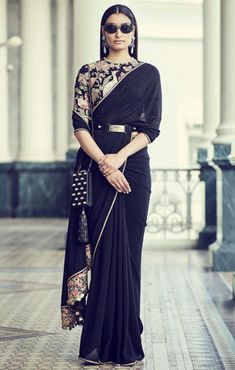 latest-saree-designs-trends-indian-designer-sabyasachi-plain-saree-2018 Black Sari, Latest Saree Trends, Sabyasachi Sarees, Saree With Belt, Saree Wearing, Saree Wearing Styles, Saree Draping Styles, Indian Sari Dress, Modern Saree