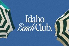 two open umbrellas with the words idaho beach club written below them on a blue sky background