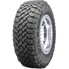 an all terrain tire on a white background