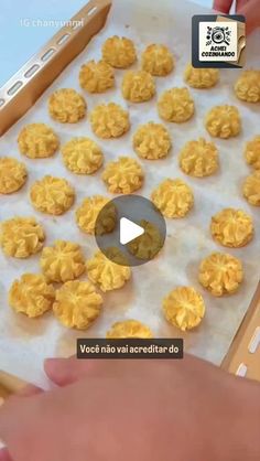 the video shows how to bake cookies and then place them on parchment paper for baking