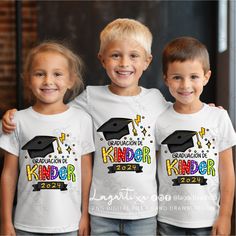 three children wearing t - shirts with graduation caps on them