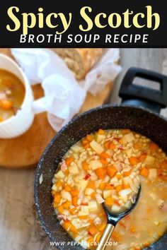 this is a bowl of soup with carrots and potatoes in it on the table