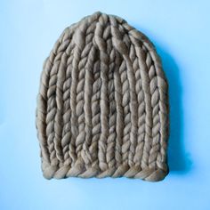 a knitted hat on a blue background