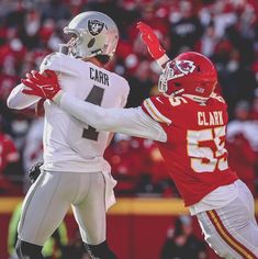 two football players in action on the field