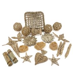 an assortment of decorative items including starbursts, pins and other things on a white background