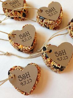 several bird seed hearts with price tags on them