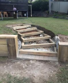 the steps are made out of wood and cement