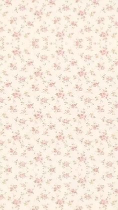 a white wallpaper with pink flowers on it