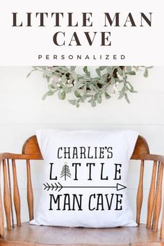 the little man cave personalized pillow is shown on a wooden chair with an arrow