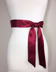 "Narrow Burgundy Sash, Burgundy Satin Sash Maroon Sash, Wine Sash Belt Wrap Belt, Waist Sash, Wedding Sash Bridal Sash, Dress Sash Satin Swank Now in a narrow version, this Satin Swank® reversible waist sash is the perfect finishing touch for your wedding, bridesmaid, or special occasion dress, or just the right piece to add instant polish to your dress or top. Depending on your waist size and the length you choose, you can wrap the sash around your waist once or up to three times. You decide wh Wedding Sash With Tie Back, Satin Bridal Belt For Bridesmaids, Satin Sash With Bow For Bridesmaids, Wedding Satin Tie Back Sash, Bridesmaid Sash With Satin Bow, Bridesmaid Satin Sash With Satin Bow, Bridesmaid Satin Sash With Bow, Elegant Red Wedding Sash, Satin Sashes For Bridesmaids