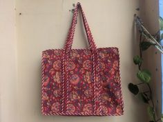 Women Tote Bag Handmade Block Printed Quilted Shoulder Bag's Indian Shopping Handbag Throw Cotton Quilted block print weekend bags 100% cotton fabric SIZE:- 14 inch X 17 Inch X 6 Inch  Usage : Cosmetic, Make-up, Travel, Toiletries, Tote Bag, Medicine, Accessories, Shoulder Bags, Handle Bag, Women Bags, Cosmetic Bag, Gift For Her, Bridesmaid Bag, Storage Bag, Grocery Bag, Shopping Bag, Carry Bags, Jhola Bag, Market Bag, Vintage Bags, Picnic Bags, Etc Shopping and much more. Perfect for Beach Visits/ Quick Grocery runs/ Carrying Kids items/ Artist Paint book and Paints /Extra Bag Washable on Cold / Delicate wash Gorgeous Prints of Hand printed cotton are brought together to give an alternate to plastic bags usage . Posted in a flat pack folded. NOTE: ✔ Disclaimer: Natural-dyed colors might b Rectangular Multicolor Beach Bag For Everyday Use, Bohemian Multicolor Reversible Bag, Multicolor Rectangular Beach Bag For Daily Use, Multicolor Rectangular Beach Bag, Casual Reversible Multicolor Bag, Rectangular Red Cotton Bag, Casual Multicolor Reversible Bag, Everyday Multicolor Rectangular Box Bag, Bohemian Red Cotton Bags