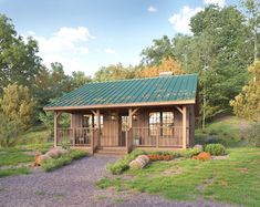 a small wooden cabin with a green roof