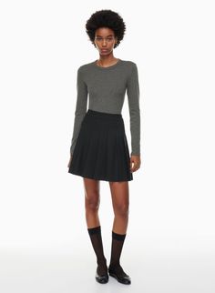 OLIVE MINI PLEATED SKIRT | Aritzia Olive Mini Skirt, Mini Pleated Skirt, Denim Vans, Outfit Plan, Great Lengths, Invisible Zip, Running Tights, Pleated Mini Skirt, Christmas Outfit