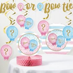 pink and blue balloons with question mark on them