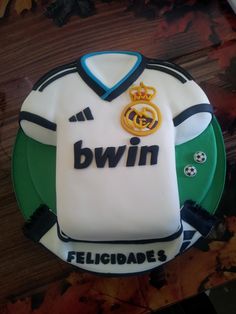 a cake that is shaped like a soccer jersey