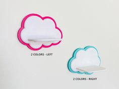 two colors left and one color right on a white wall with clouds hanging from it