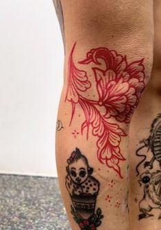 a person with tattoos on their legs