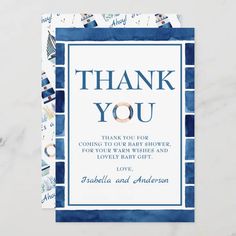 a blue and white thank card with the words, thank you in gold on it