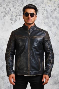 Vintage Biker Distressed Leather Jacket This men's biker leather jacket is manufactured from genuine cowhide leather. Designed by our experienced craftsman this vintage leather jacket features hand distressed detailing. With 4 zipper pockets on front, 2 on back and front zipped closure with stand collar this distressed leather jacket is a complete package for a biker. The intricately designed sleeves accentuates this classic vintage biker jacket Outfit Type: Leather Biker Jacket Material:    Out Rugged Black Biker Jacket For Biker Events, Black Rugged Biker Jacket For Biker Events, Black Rugged Biker Jacket For Events, Distressed Biker Leather Jacket For Biker Events, Distressed Brown Moto Leather Jacket For Biker Events, Vintage Black Long Sleeve Leather Jacket For Winter, Distressed Leather Biker Jacket For Biker Events, Distressed Brown Leather Jacket For Biker Events, Distressed Leather Jacket For Biker Events