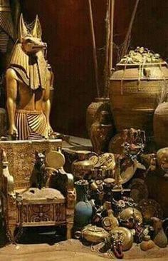 an assortment of vases and statues are shown in this image, including the egyptian god tutane