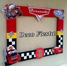 the frame is decorated with cars and numbers for a child's bedroom wall decoration