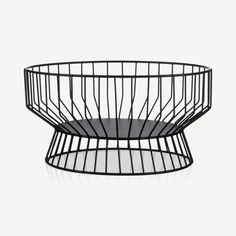 a black wire bowl on a white background