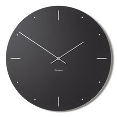 a black clock with white numbers on the face